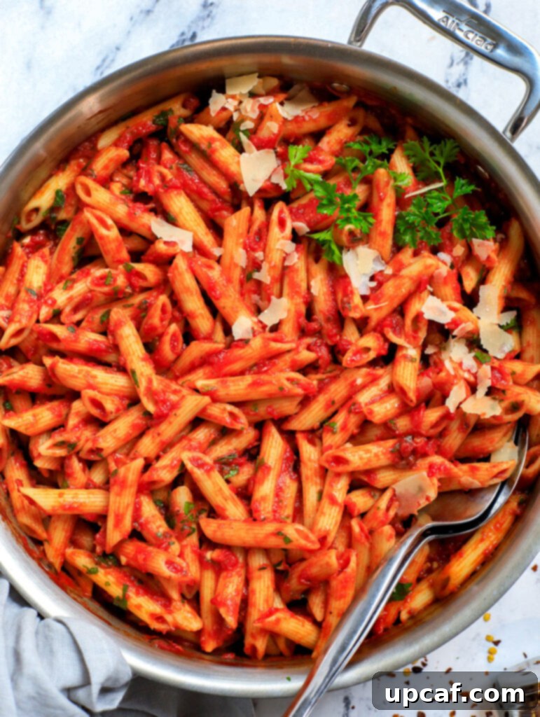 Raging Inferno Pasta 12 Top down shot of spicy arrabbiata pasta in a pot, ready to be served.