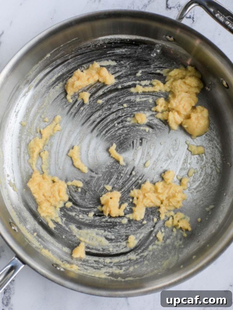 Fiery Buffalo Chicken Pasta Bake 6 Butter and flour forming a paste in a pan.