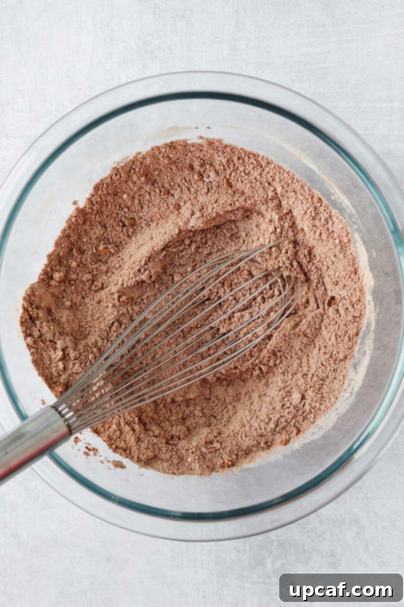 Wet ingredients beautifully combined in a separate bowl.