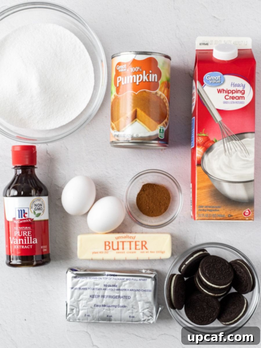 Top down shot of ingredients for mini pumpkin cheesecakes.