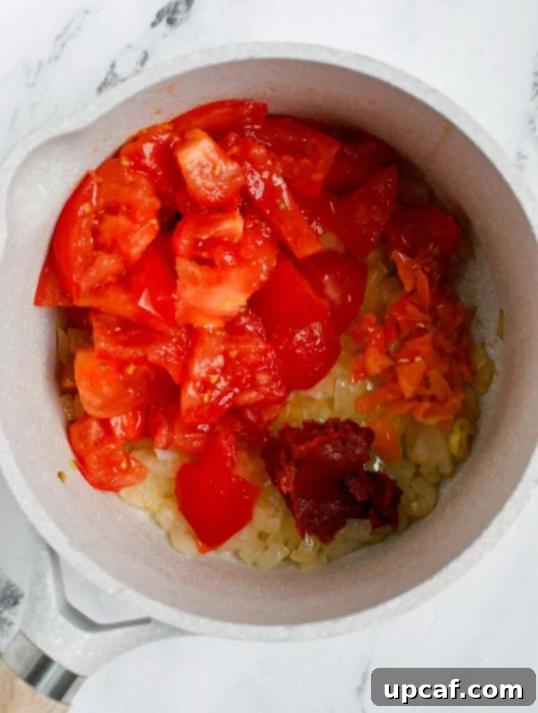 Top down shot of mixing sauce ingredients in a bowl.