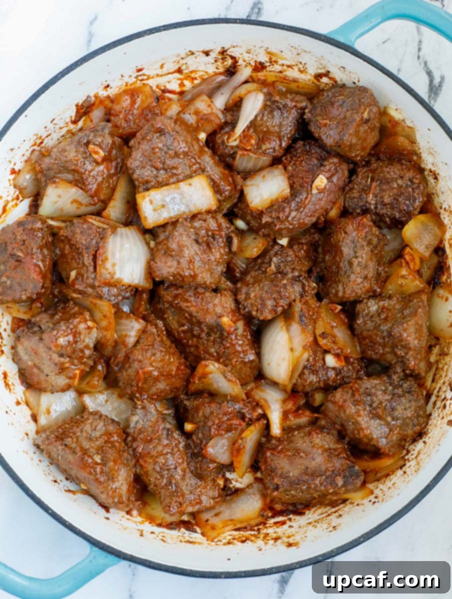 beef sauteed with onions and tomato paste