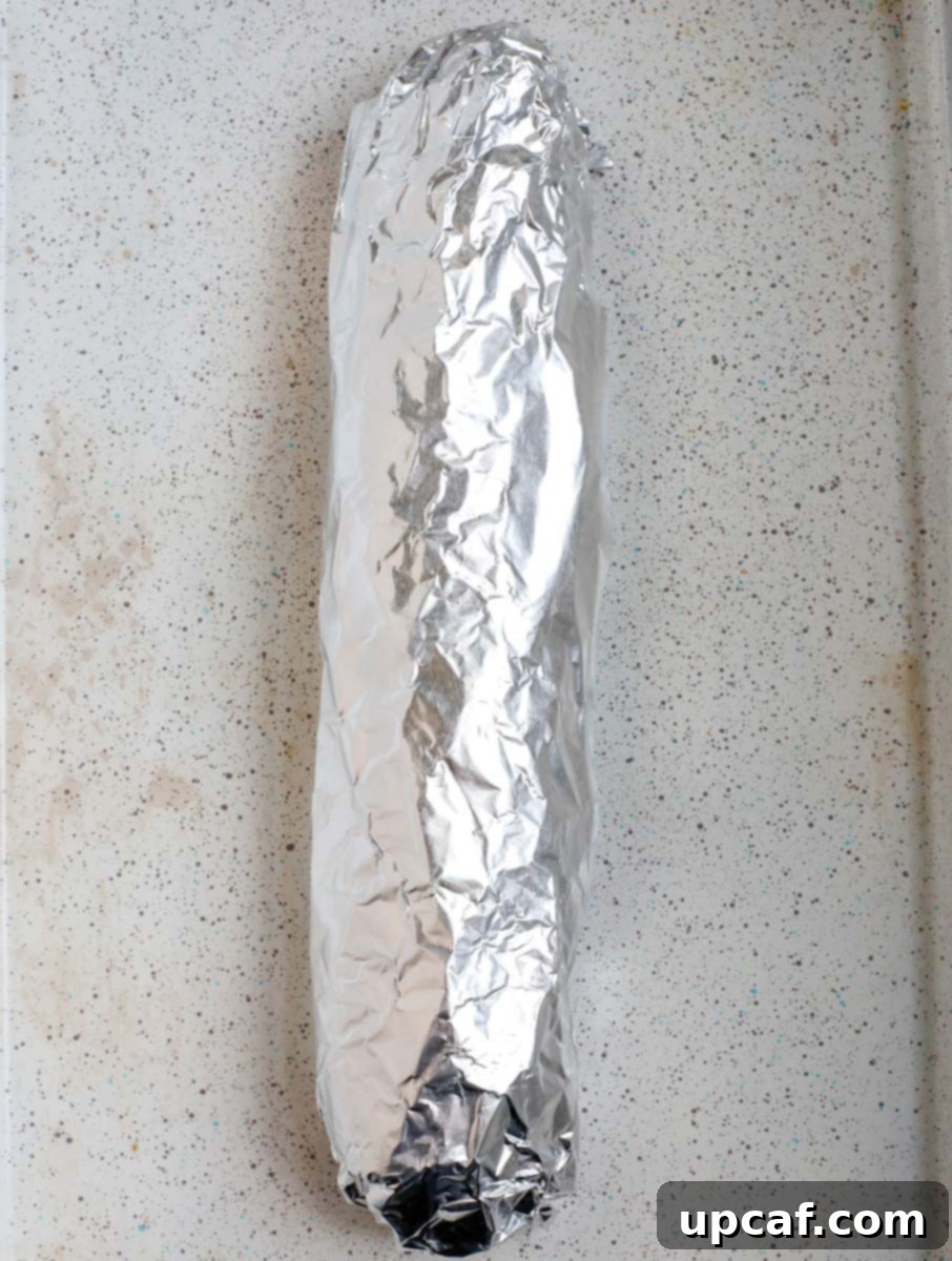 bread wrapped in foil to bake