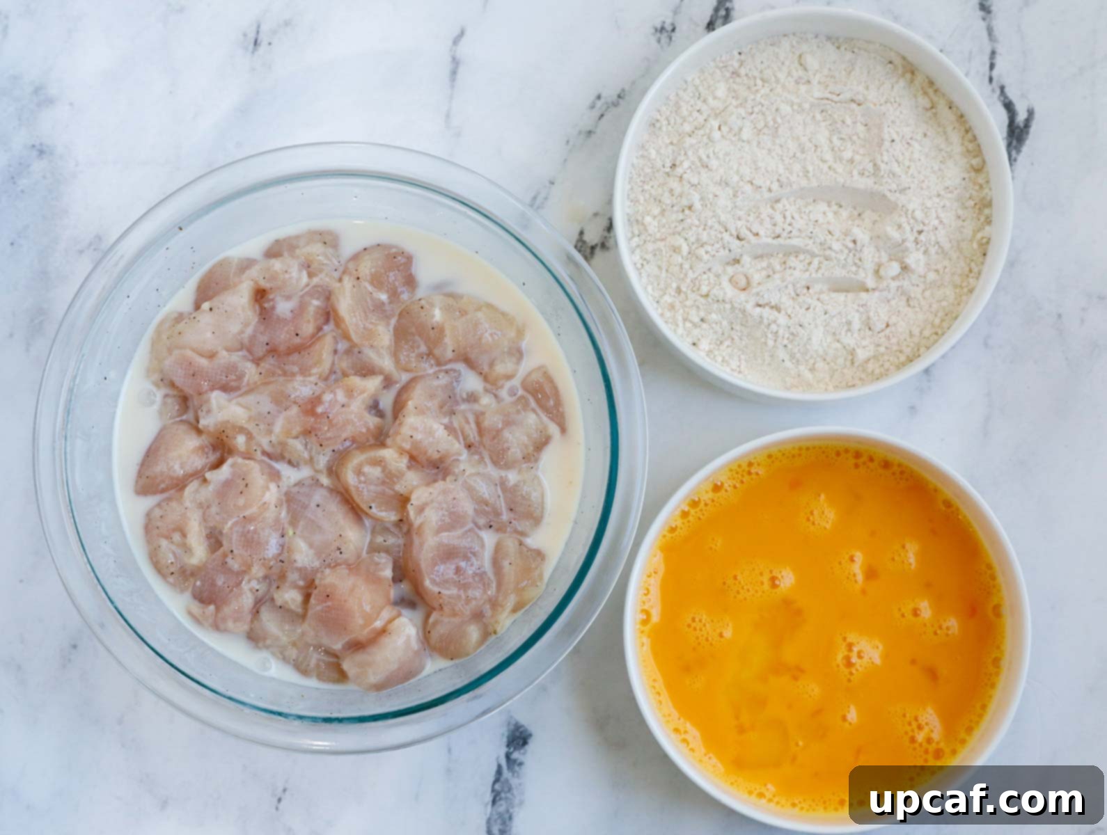 Top down shot of ingredients for chicken nuggets.