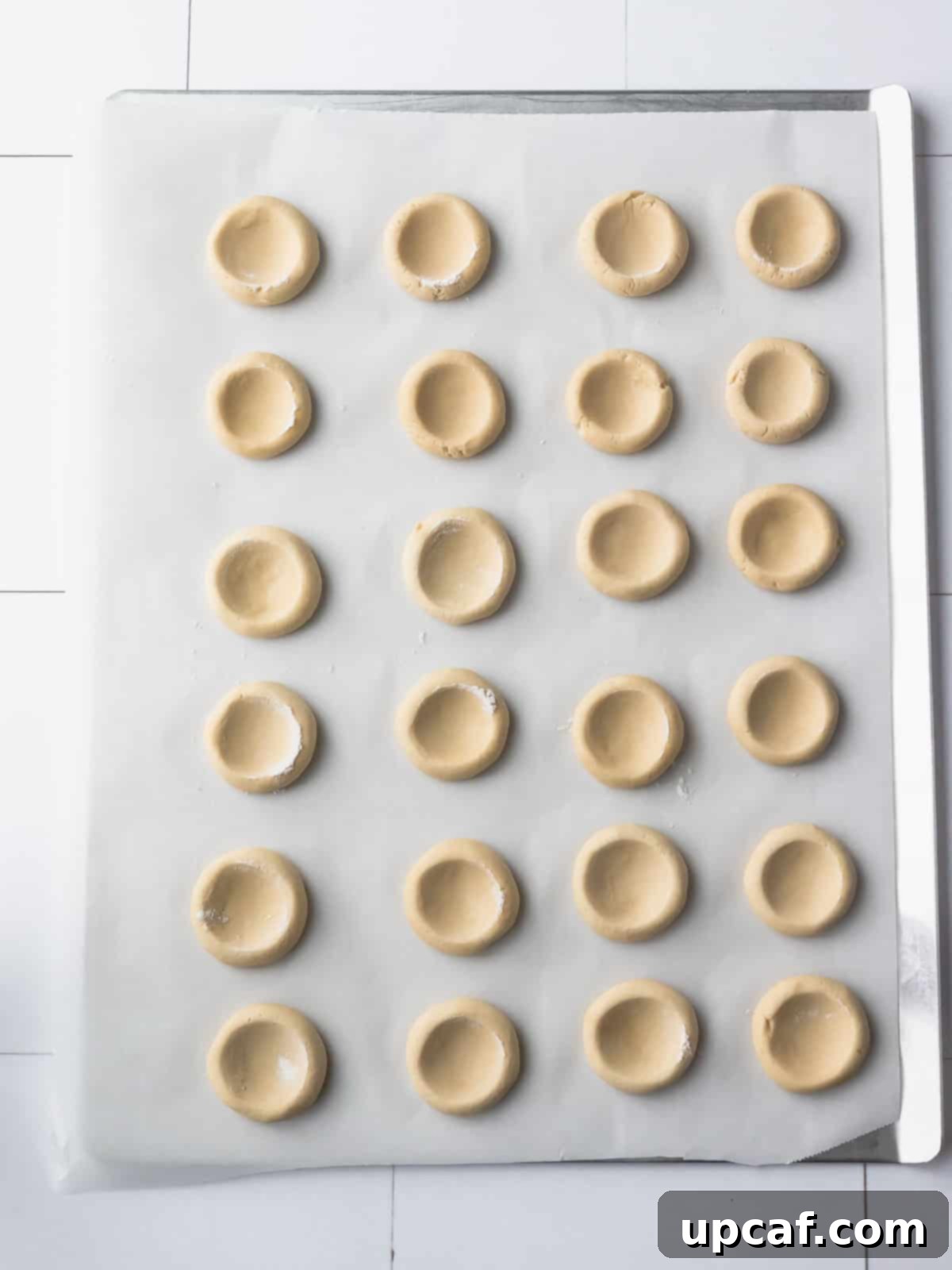 raspberry jam cookies after thumbprinting