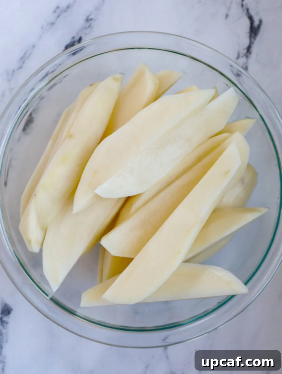 Potato slices in a bowl.