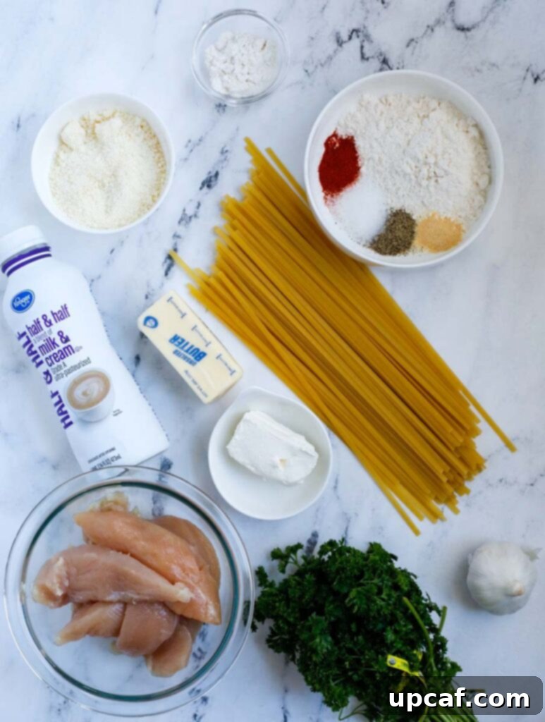 Top down view of alfredo ingredients neatly arranged, ready for cooking.