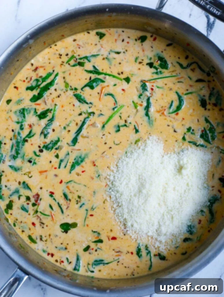 Creamy sauce with spinach and Parmesan cheese stirred in.