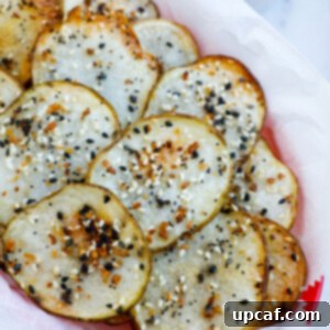 Everything Bagel Potato Crisps 7 Top down shot of crispy homemade Everything Bagel Potato Chips in a basket.