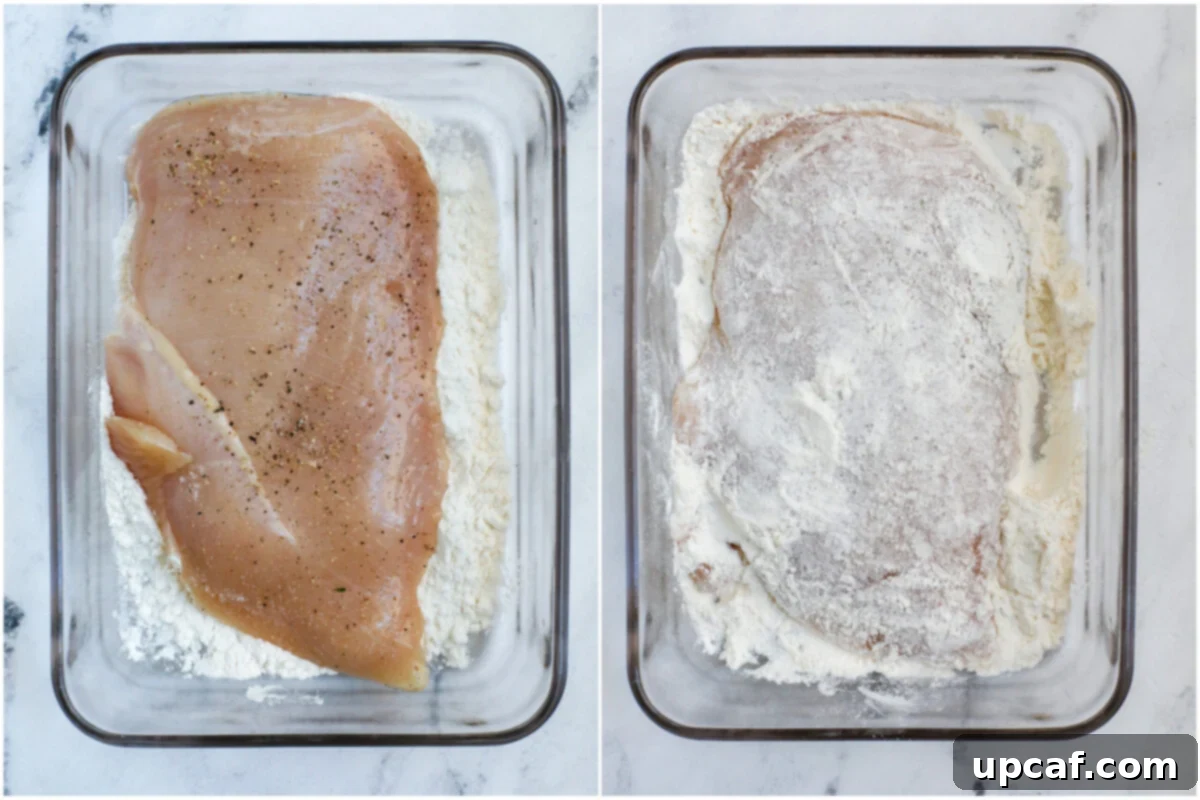 Chicken cutlets evenly coated in all-purpose flour, ready for pan-searing.