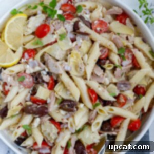 Top down shot of Greek Tuna Pasta Salad in a bowl.