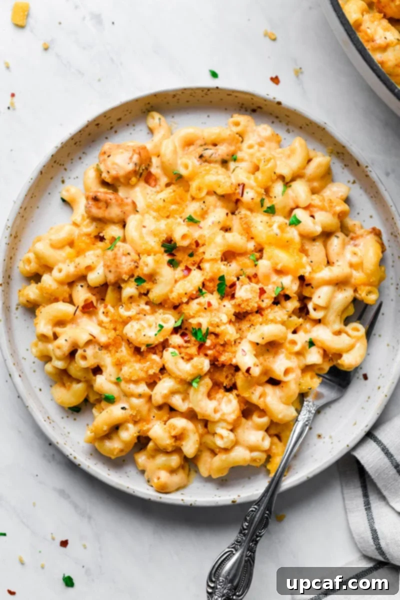 Cajun Chicken Mac and Cheese served beautifully on a plate, ready to be enjoyed.