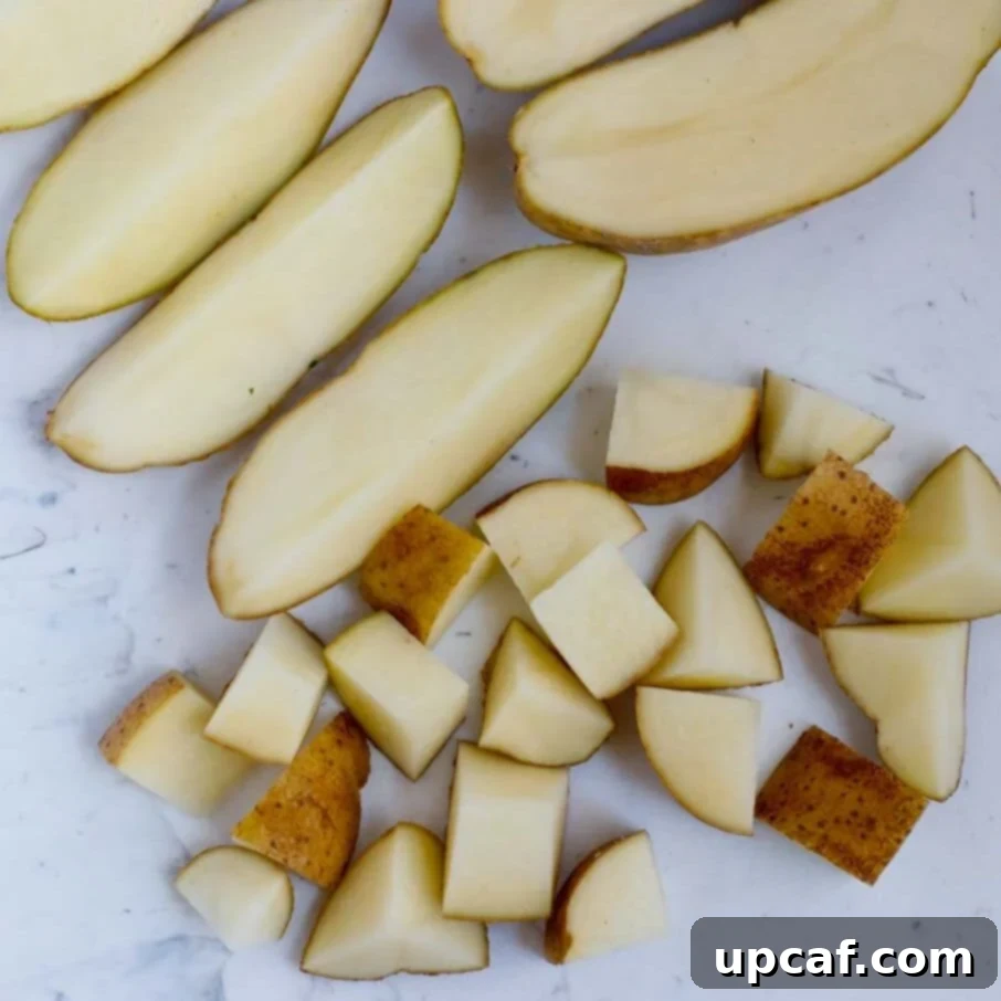 How to cut up potatoes to make air fryer roasted potatoes.