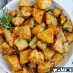 Overhead image of a bowl of air fryer crispy potatoes.