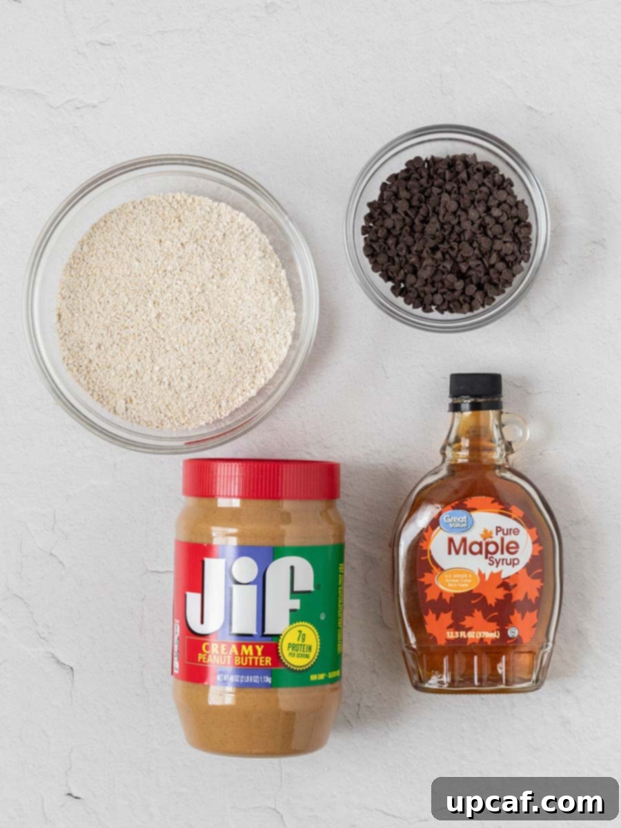 Ingredients for no bake chocolate peanut butter oatmeal bars laid out on a kitchen counter.