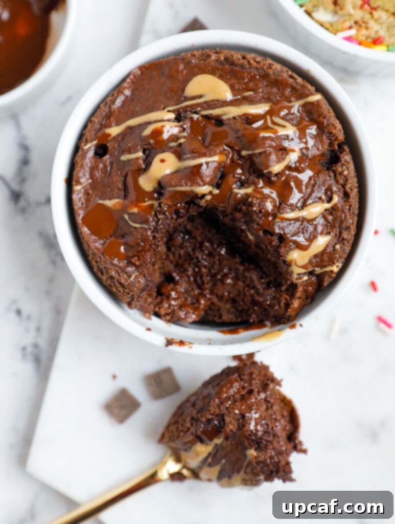 Chocolate Peanut Butter Banana Oatmeal Bake 10 Chocolate PB baked oats with a spoonful scooped out.