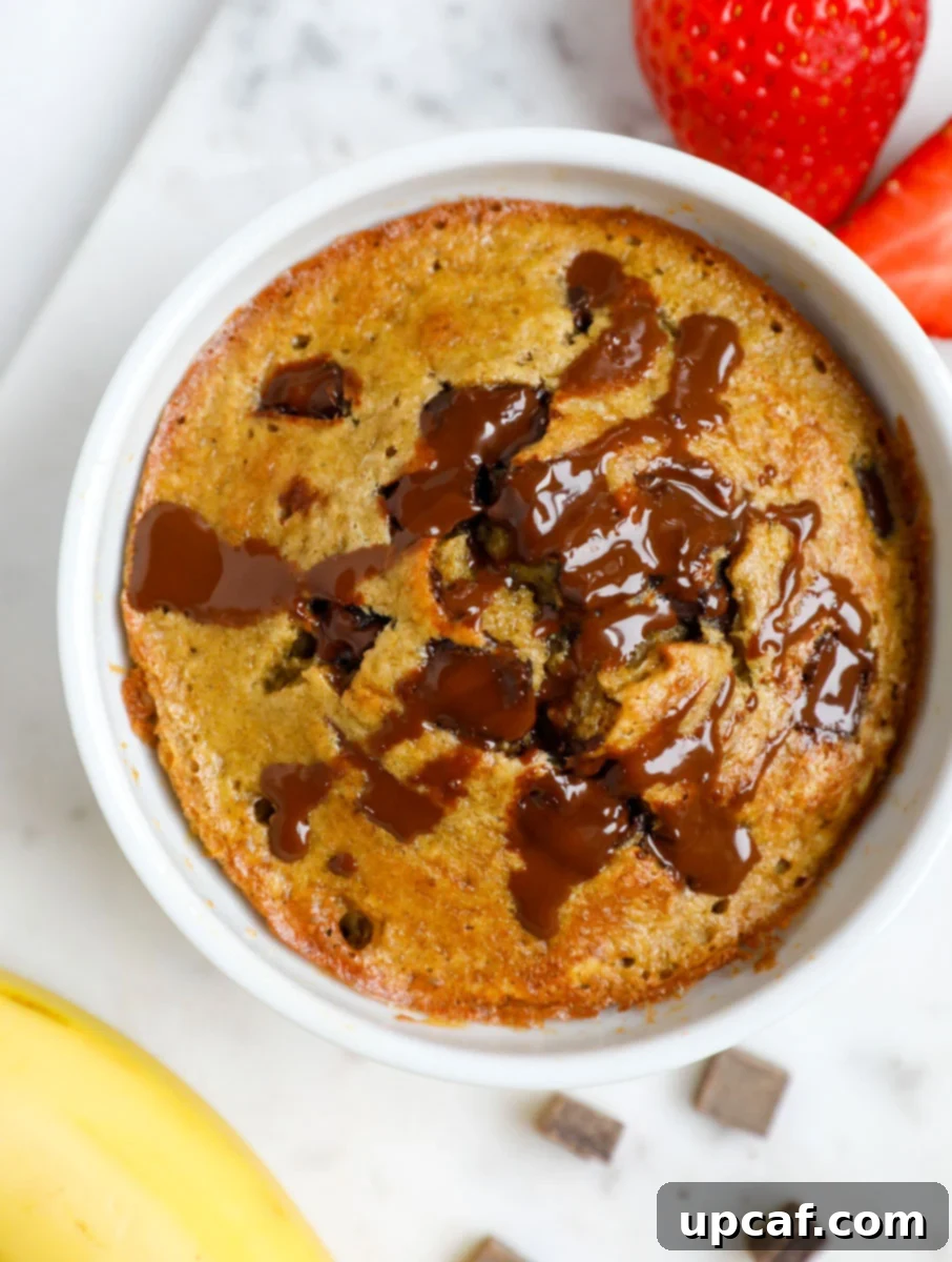 Baked Oats Reimagined Three Delicious Versions 9 Baked oatmeal with banana slices and chocolate chips as topping.
