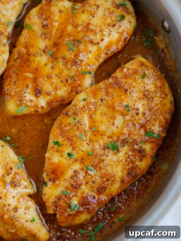 Close up of honey mustard chicken.