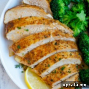 Sliced chicken breast on a plate.