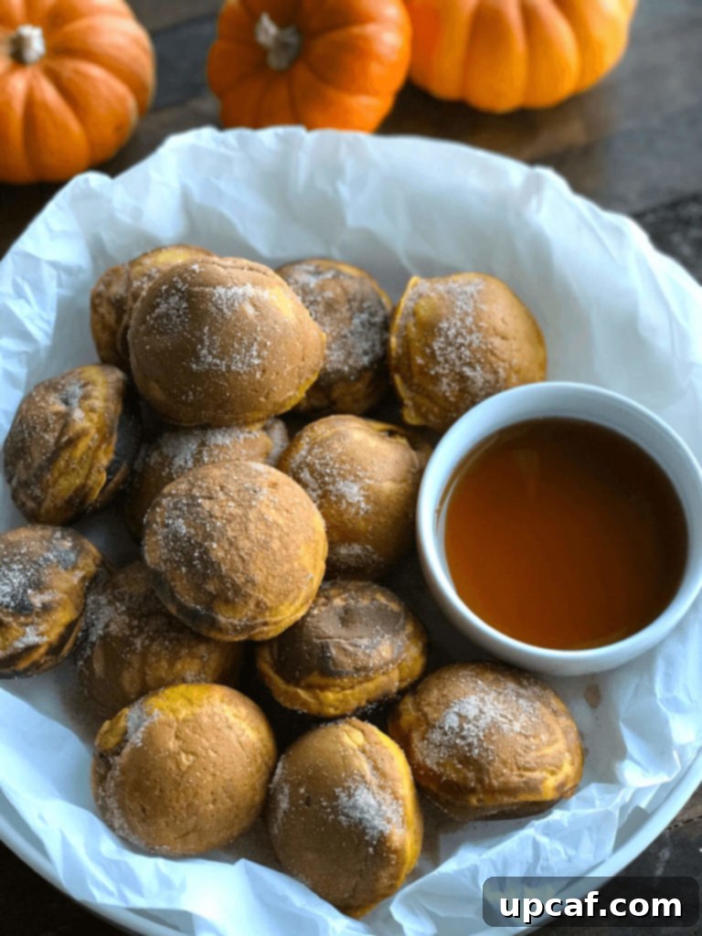 A bowl filled with freshly made Pumpkin Pancake Bites