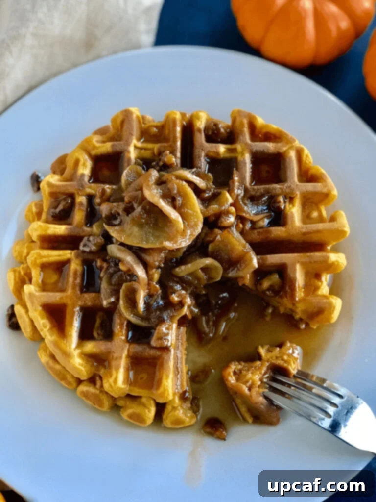 Golden Pumpkin Waffles with Candied Walnut Crunch 2 Pumpkin Waffles with candied walnuts, drizzled with maple syrup