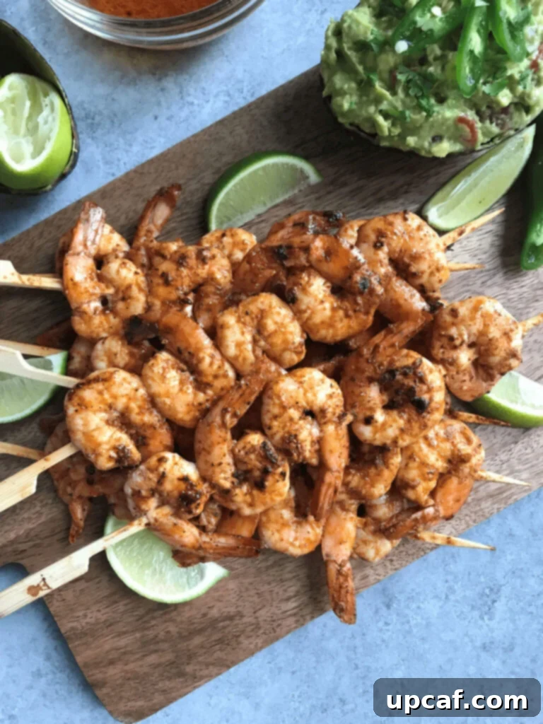 Grilled Chili Lime Shrimp grilled shrimp skewers on a serving platter