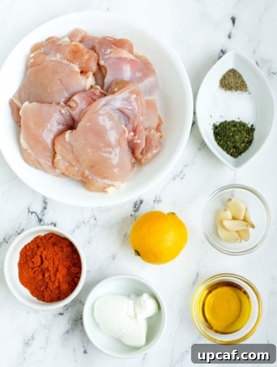 Ingredients needed to make homemade chicken shawarma, laid out clearly.
