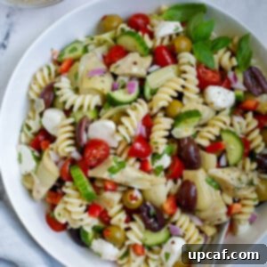 Vibrant Mediterranean Pasta Salad 10 A Mediterranean pasta salad in a bowl.