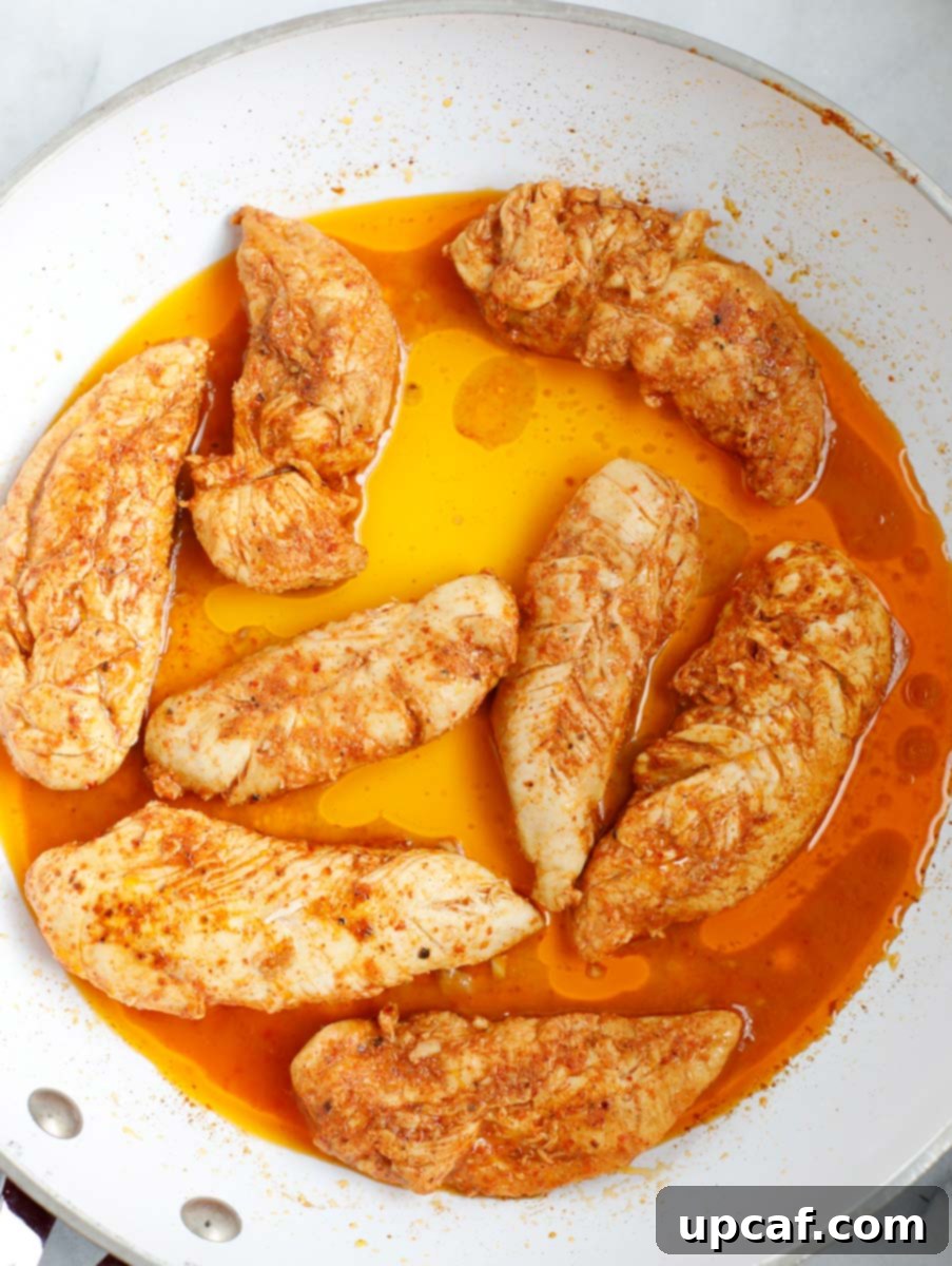 Creamy Avocado Chicken Salad 5 Chicken cooked in a pan.