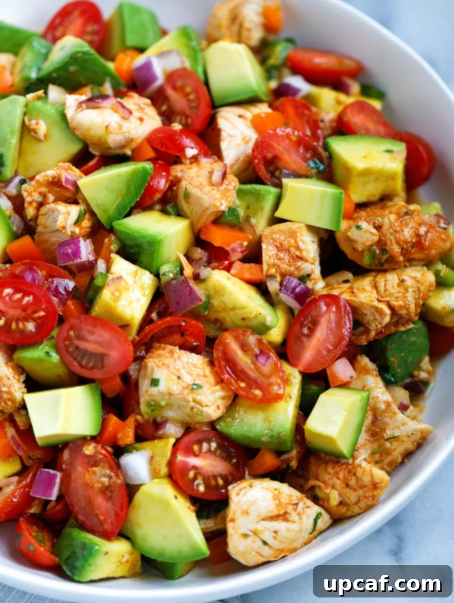 Creamy Avocado Chicken Salad 8 Close up view of a bowl of avocado chicken salad.