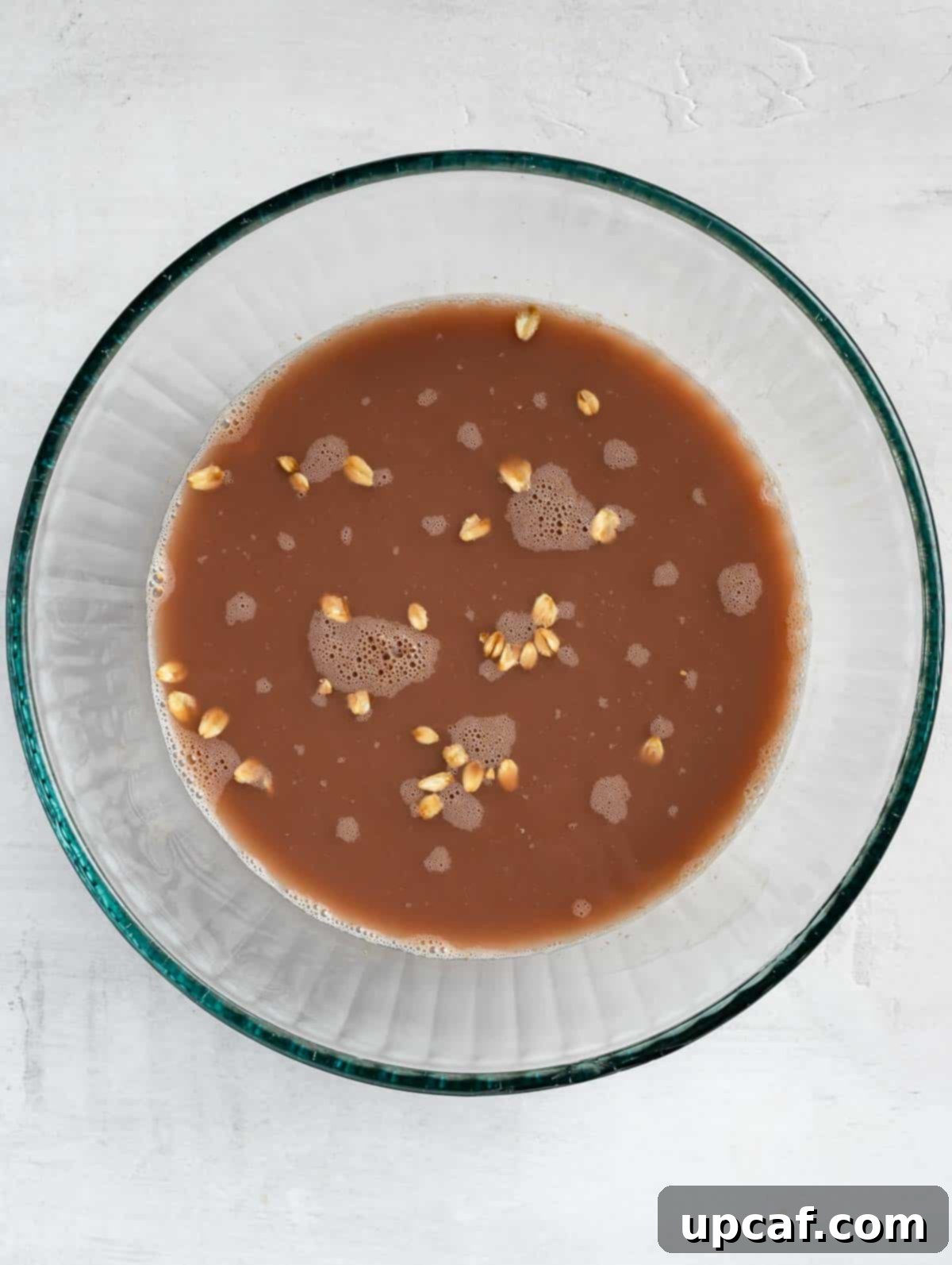 chocolate oats ingredients in a bowl before leaving overnight