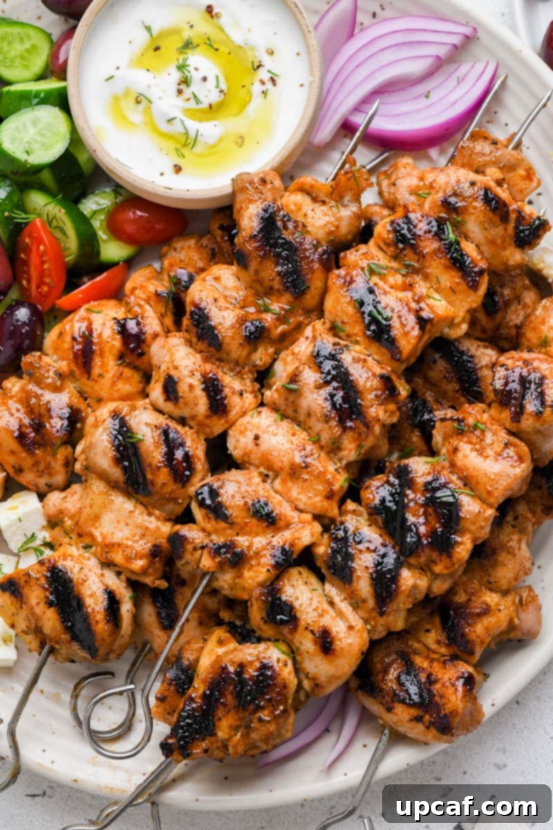 Close-up shot of cooked Lemon Garlic Chicken Skewers, showing the golden-brown char and juicy chicken.