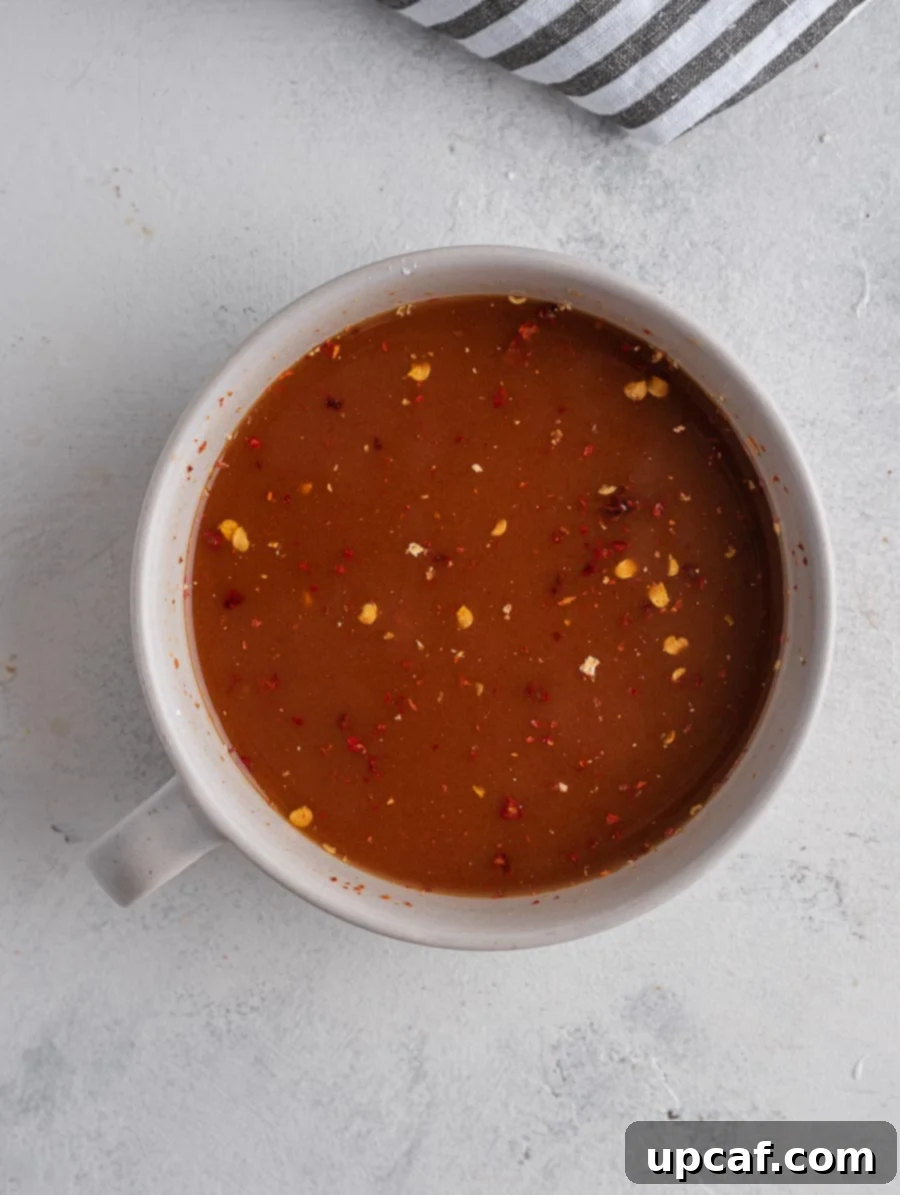 Quick Sticky Mongolian Chicken 4 mongolian sauce in a cup