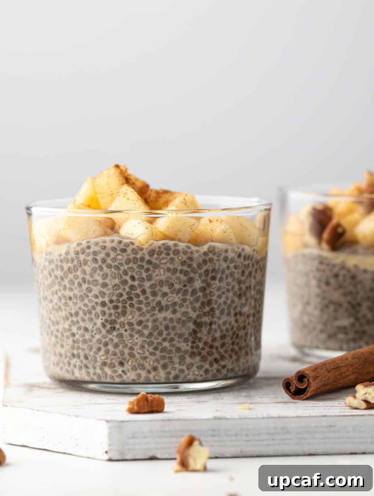 Overnight Chia Pudding topped with apples and sprinkled with cinnamon powder.