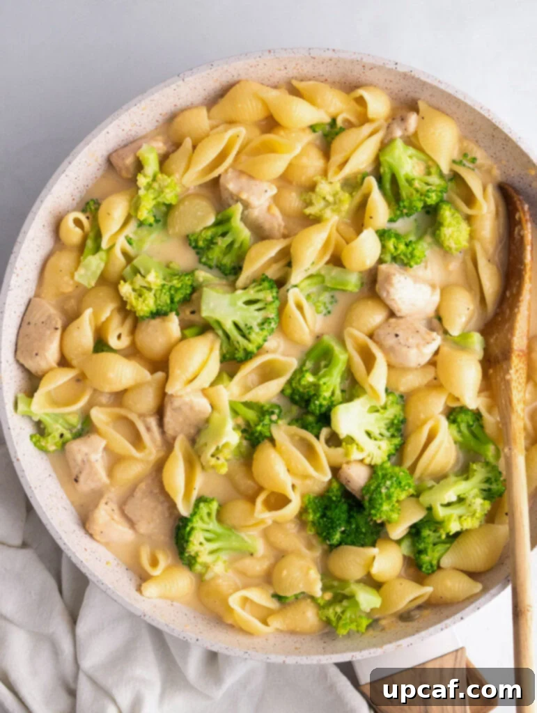 top down shot of the creamy broccoli chicken in a skillet