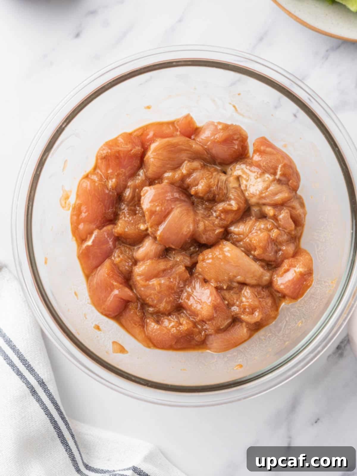 Original Sichuan Kung Pao 4 Chicken marinated in a bowl.