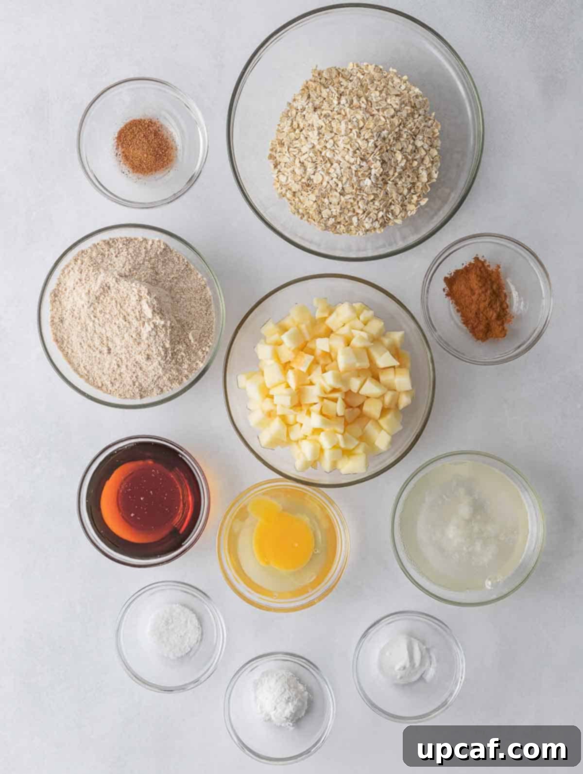 Cozy Apple Pie Cinnamon Oat Cookies 3 Ingredients needed to make healthy apple pie oatmeal cookies, including oats, flour, apples, and spices.