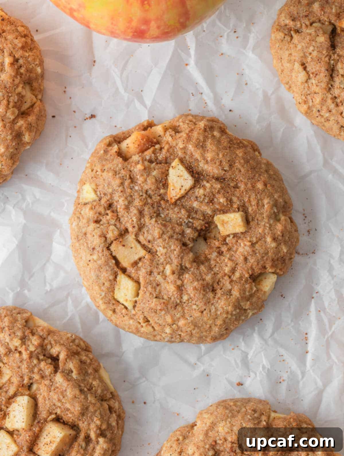 Cozy Apple Pie Cinnamon Oat Cookies 8 Overhead view of healthy apple pie oatmeal cookies, perfectly baked and ready to eat.
