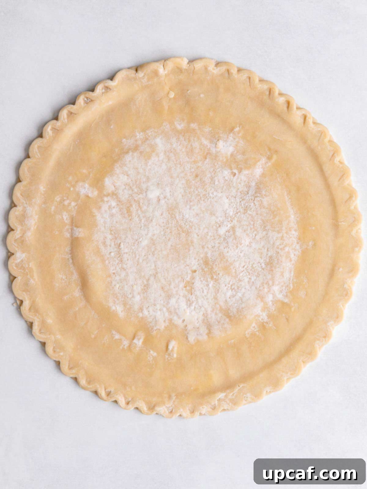 uncooked pie crust laid out