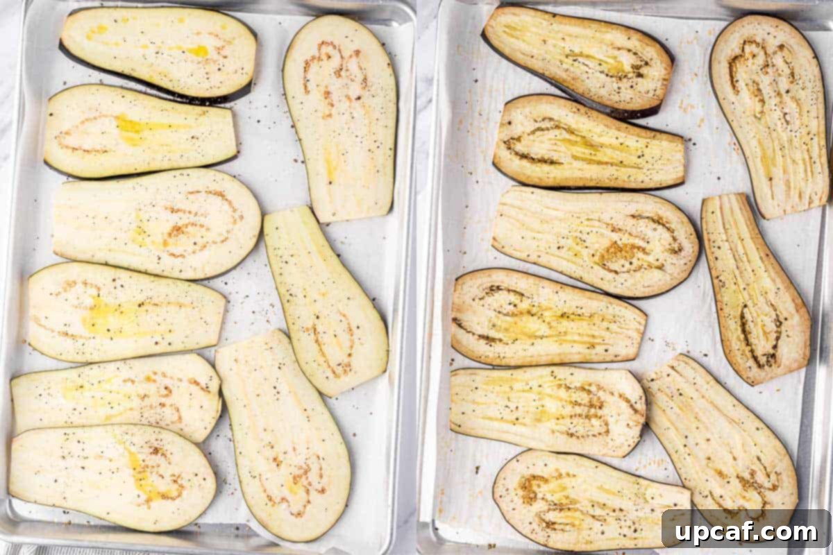 Evenly sliced eggplant rounds, lightly browned and perfectly roasted, arranged on a baking sheet lined with parchment paper.