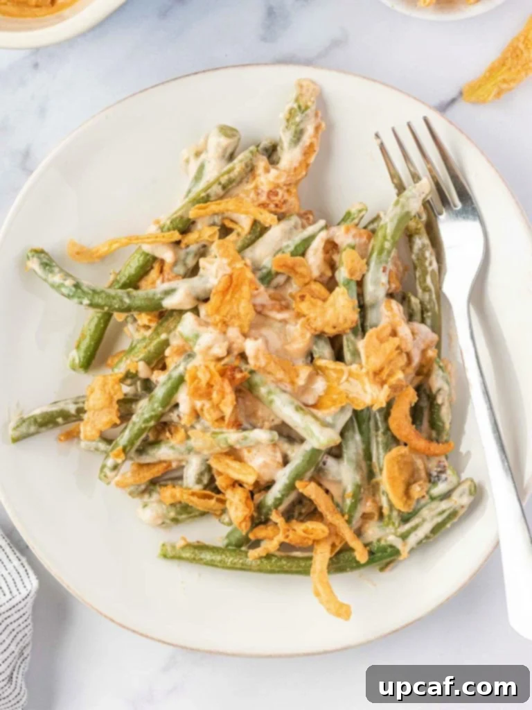 Cheesy Green Bean Casserole served on a plate