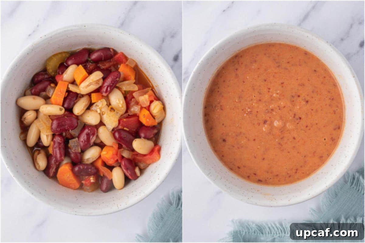 The process of grinding a portion of the beans and chili mixture to create a smooth and creamy texture for the finished kidney bean chili.