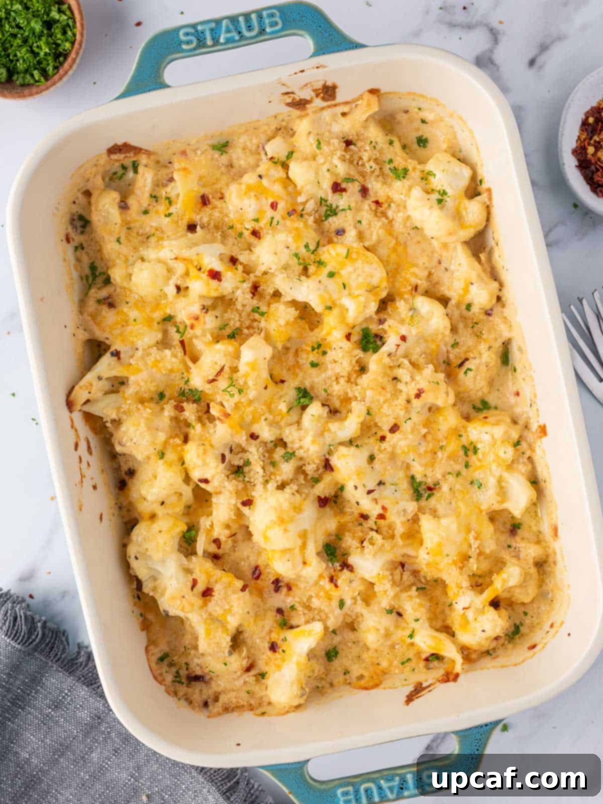 Cheesy Keto Cauliflower Bake 2 Low carb mac and cheese in a casserole dish.