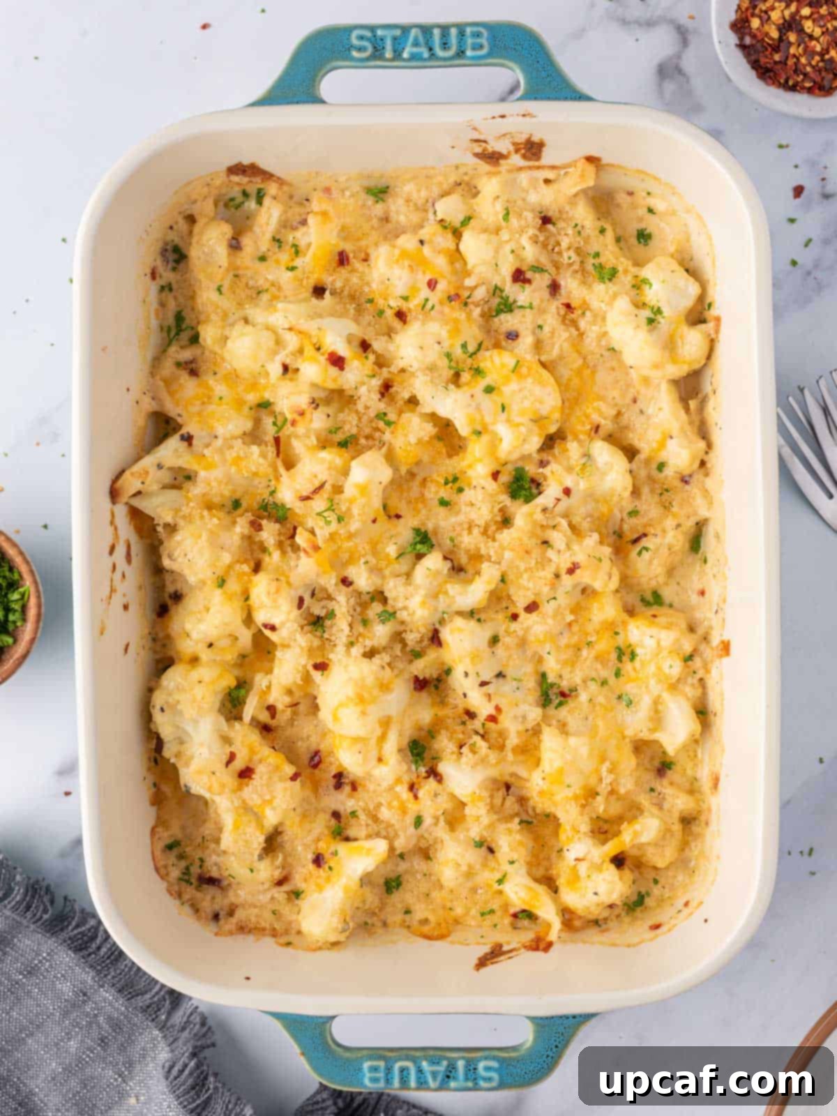 Cheesy Keto Cauliflower Bake 11 Cauliflower mac and cheese in a casserole dish.