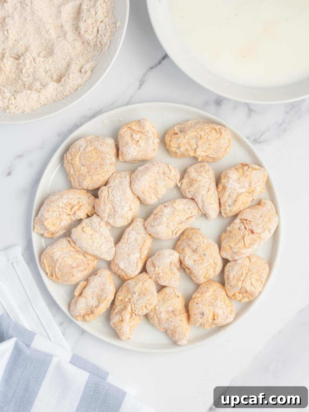 Caramelized Honey Walnut Chicken 5 coated chicken on a plate.