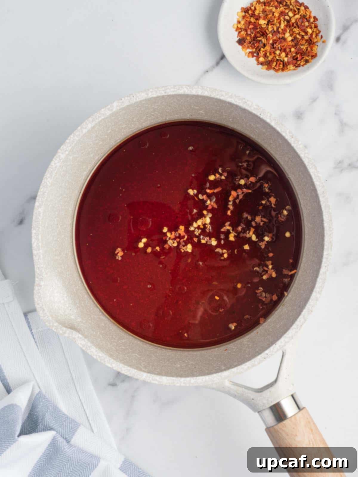 Caramelized Honey Walnut Chicken 6 honey sauce in a pot