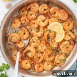 A skillet of garlic and lemon shrimp.