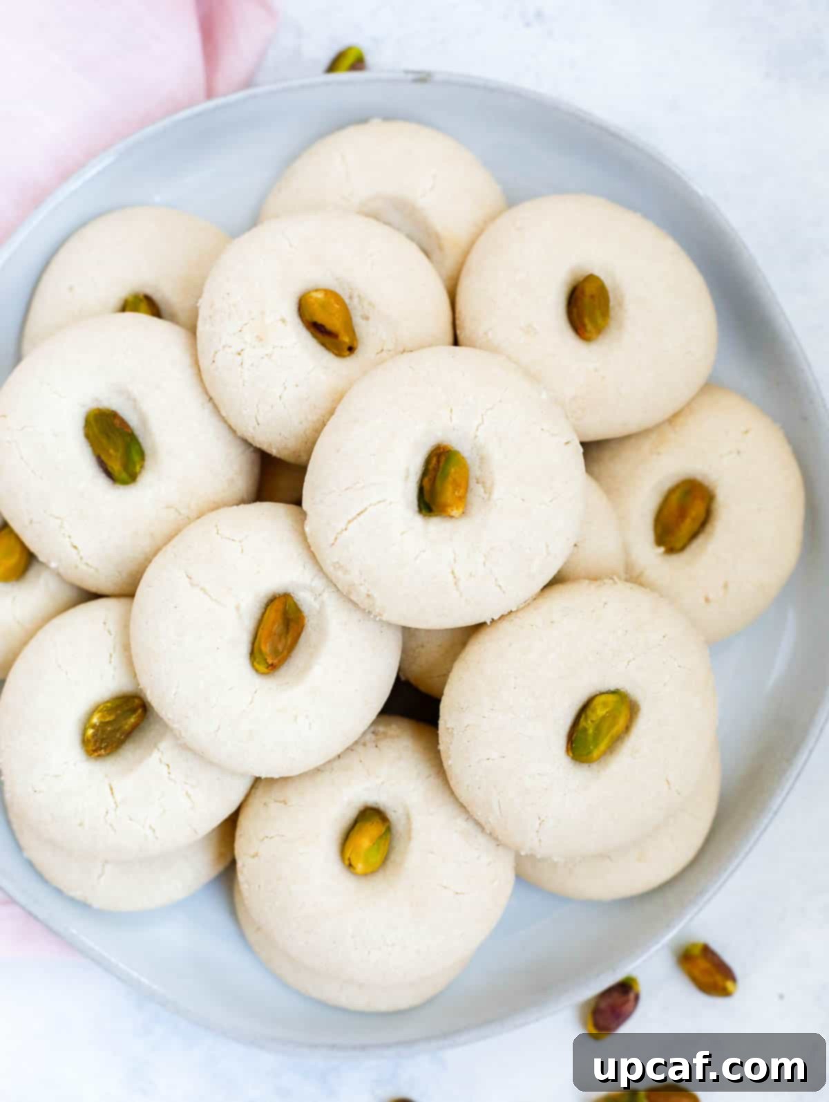 top down shot of the ghraybeh cookies in a white plate