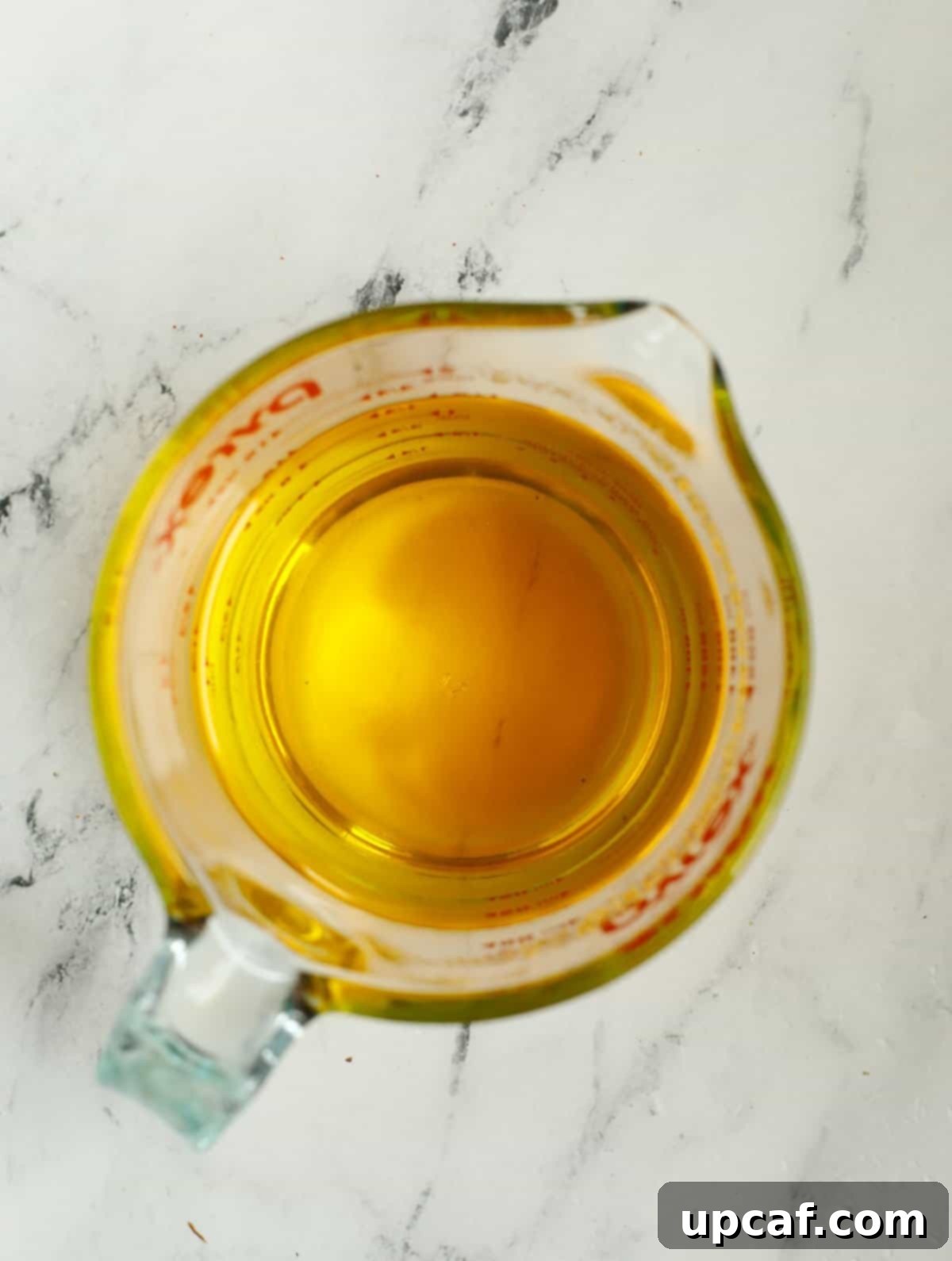 Jeweled Pistachio Nests 6 melted ghee in a measuring cup