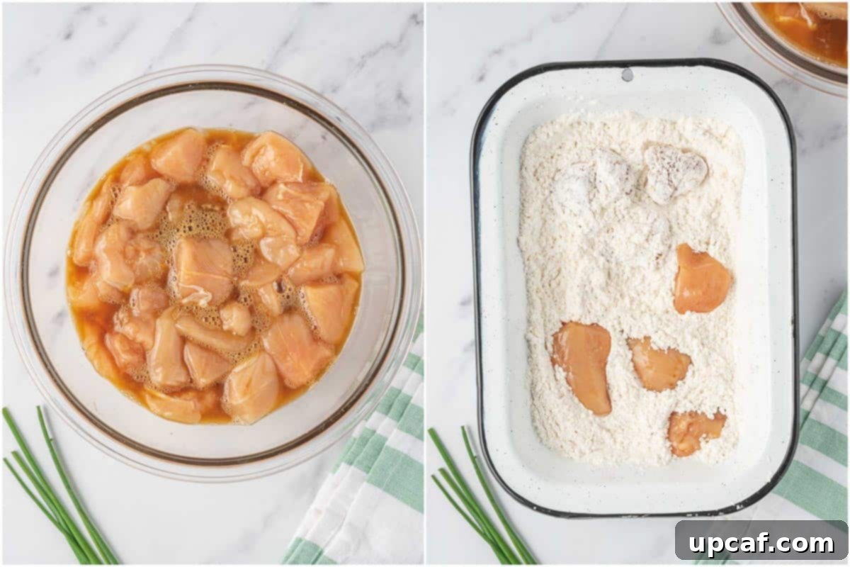 Crispy Air-Fried Orange Chicken 4 A close-up image showing chicken pieces being dredged in a mixture of flour and cornstarch, ensuring an even coating for ultimate crispiness.